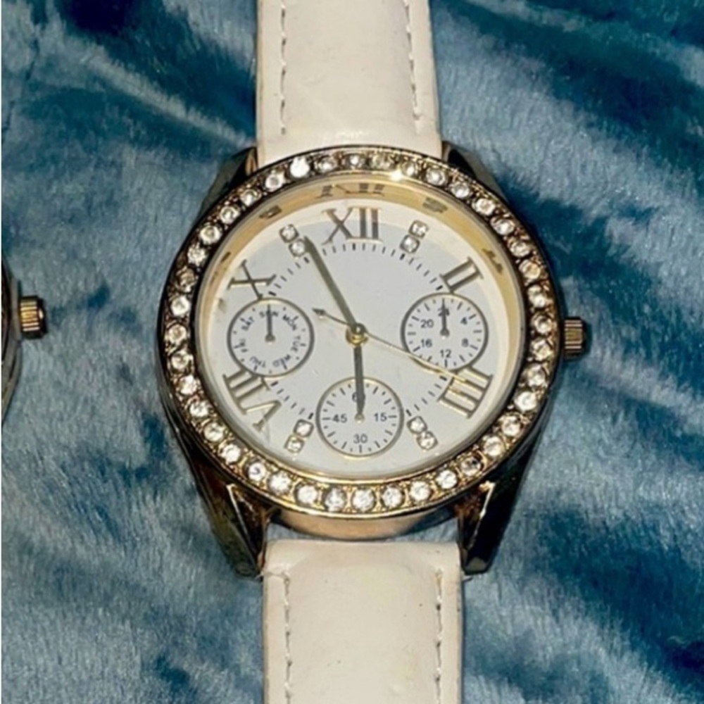 C.C Ivory White and Gold-tone Watch with sparkling Rhinestones.